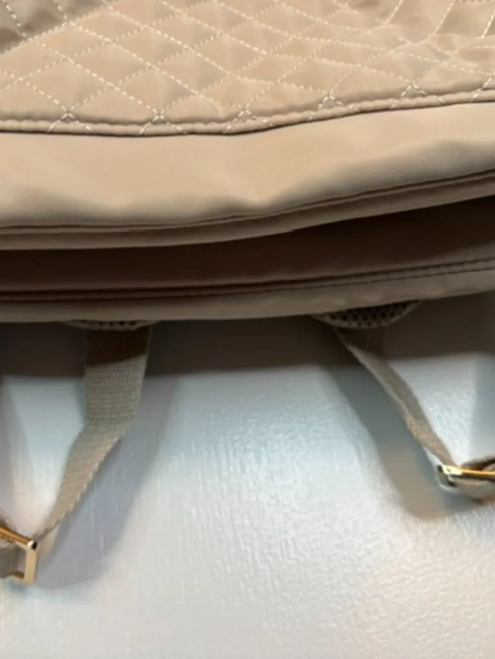 Paris Hilton Tan Quilted Backpack with Front Zipper Pocket